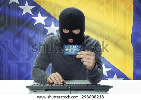 Dark-skinned hacker with credit card and flag on background - Bosnia and Herzegovina