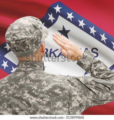 Soldier saluting to USA state flag conceptual series - Arkansas