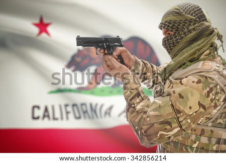 Male in muslim keffiyeh with gun in hand and flag on background series - California