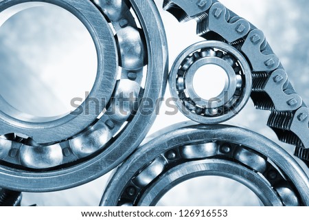 ball bearings, pinion-gears set against titanium, blue toning idea