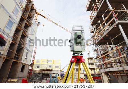 surveying measuring instrument inside construction plant