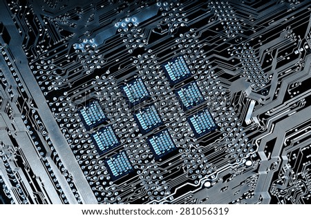 computers mother and circuit-board with large micro-chips, electrodes and resistors