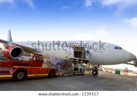 loading cargo onto airplane