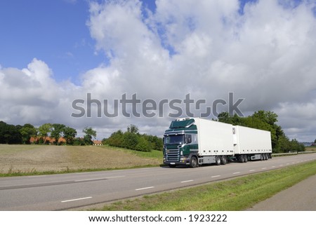 clean white truck, lorry diving in the country
