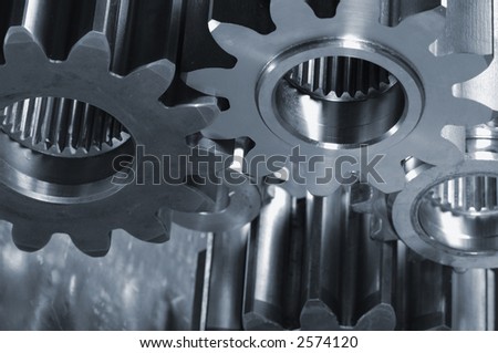 industrial gear-machinery in a metallic bluish cast