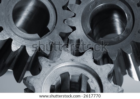 smaller gearbox-gears machinery in a bluish metallic tone