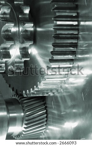 gear-machinery concept against titanium, all in a green metallic tone