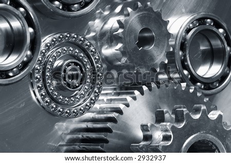 gears and bearings idea against steel-background dark metallic blue tone