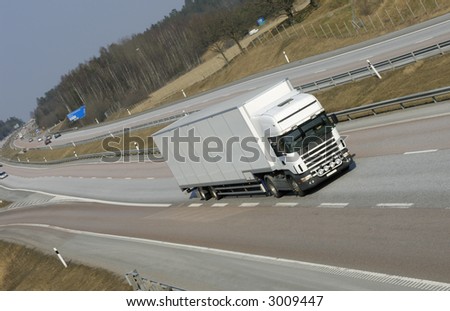 clean white truck driving on highway