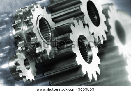 gear machinery in light green against titanium background in blue toning