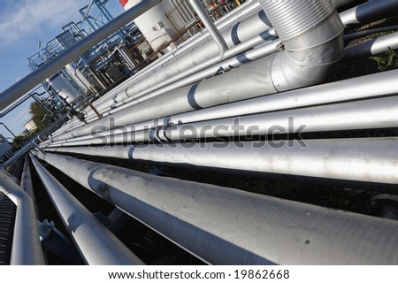 giant pipeline construction, ultra wide angle, as seen inside oil refinery