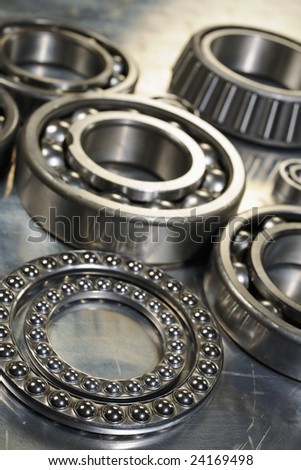 large industrial ball-bearings in natural color against steel background