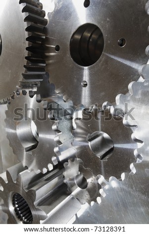 industrial gear parts against aluminum, natural colors