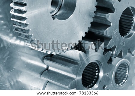 gear wheels of titanium and steel, metal blue toning idea. new gears.