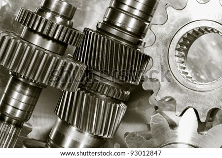 gears, cogs and pinions, set against titanium background, duplex brown toning idea
