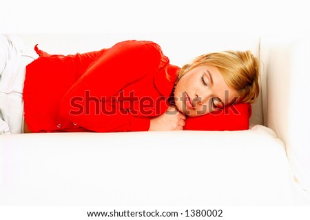 Young pretty women laying on couch and sleeping