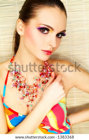 Portrait of attractive beautiful young sexy woman with artificial eyelashes and beautiful makeup