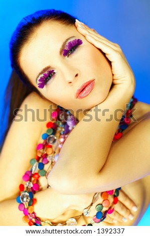 Portrait of attractive beautiful young sexy woman with artificial eyelashes and beautiful makeup