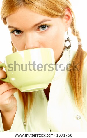 Portrait of attractive beautiful young woman with green cup od black coffee