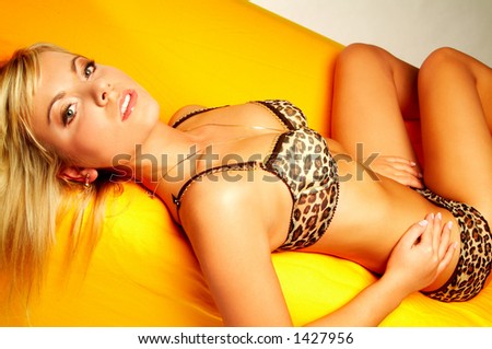 Sexy blond women on couch
