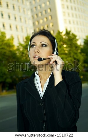 Business woman with headphones