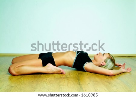 Young beautiful woman during fitness time and exercising