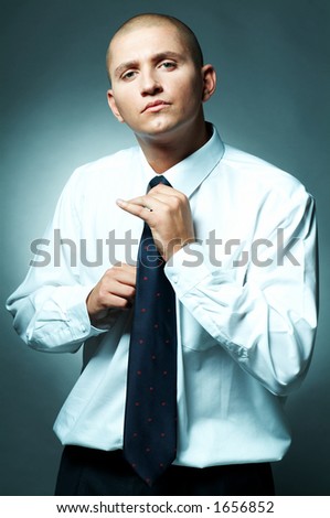 A Young businessman with tie and white shirt