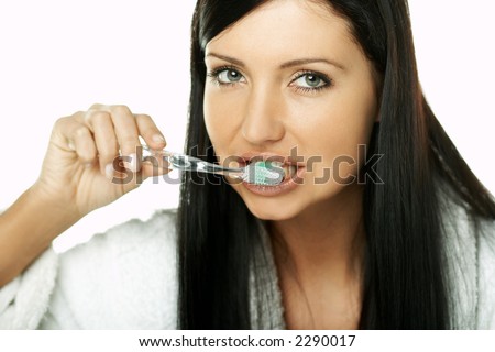 Portrait of Beautiful brunette woman doing daily morning routines (the make up series)