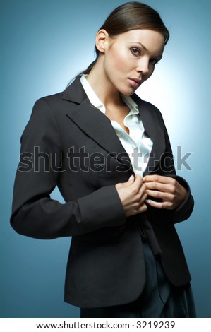 Beautiful and sexy brunette business woman isolated on clear background.