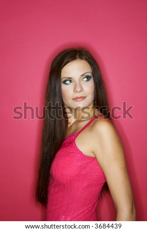 Portrait of Young woman isolated on colour background