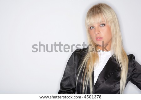 Beautiful and sexy blond business woman isolated on clear background