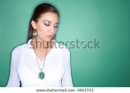 Beautiful and sexy brunette woman isolated on clear colour background