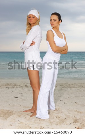 Two young women spending time at the beach