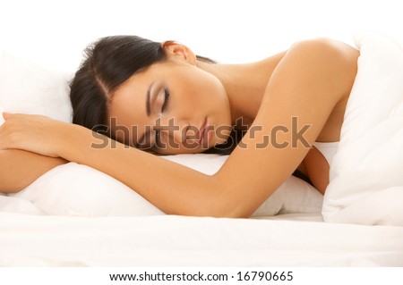 Portrait of 20-25 years old beautiful woman on white bed
