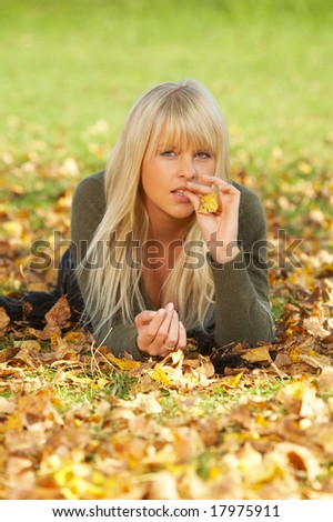 Beautiful sexy woman in natural autumn outdoors