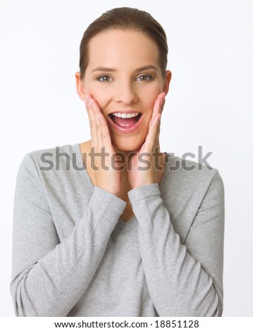 Portrait of beautiful young woman showing surprise gesture