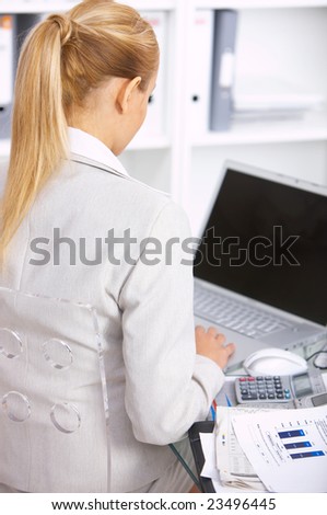 Young Beautiful business woman working in office