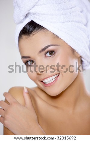 Portrait of beautiful woman wearing towel on her head