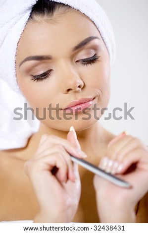 Portrait of beautiful woman wearing towel on her head