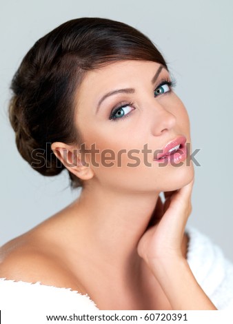 stock photo Portrait of beautiful woman she is isolated on grey