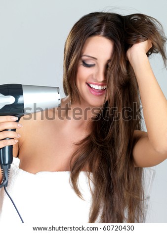 Lifestyle - Pagina 5 Stock-photo-portrait-of-beautiful-woman-she-holding-hair-dryer-60720430