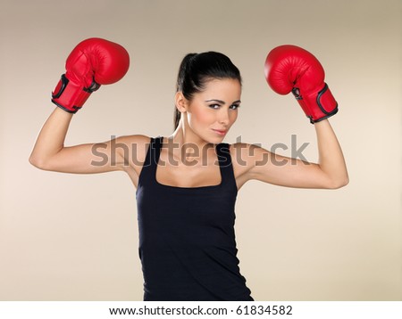 Young beautiful woman during fitness and boxing