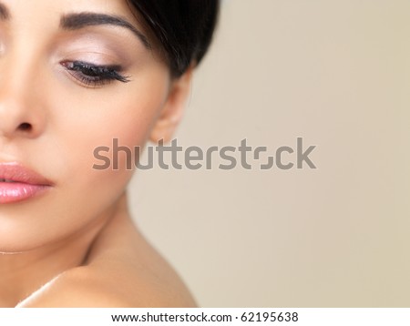 Portrait of beautiful woman looking on her left
