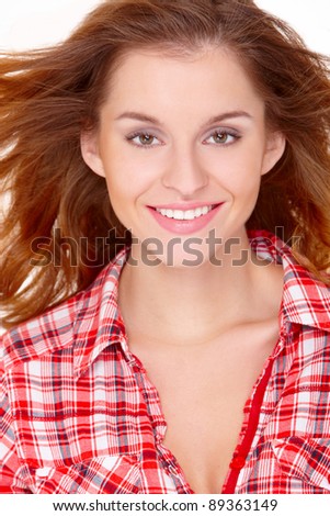 Lovely young woman in casual clothing, white background
