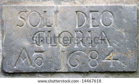Stone sign with Soli Deo Gloria, Latin for 