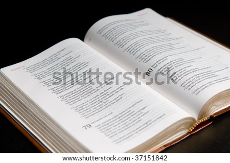 Closeup of a Dutch Bible on a black background
