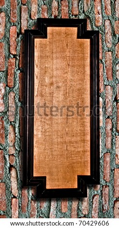 The Vintage wooden frame on brick wall background