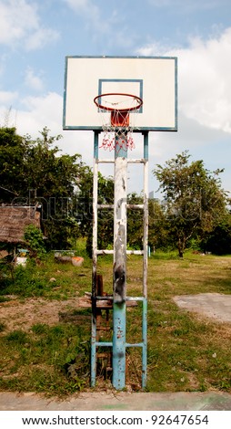 The Old basketball court on blue sky background