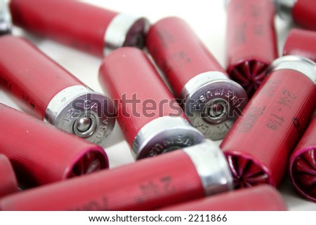 A shallow depth of field reveals that the shotgun shells are made in the united states of america.