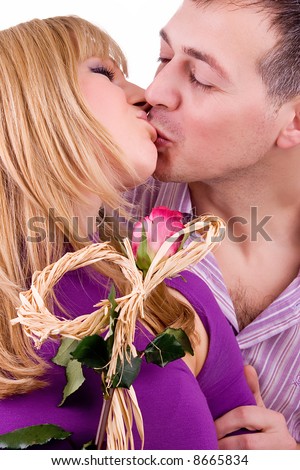 young couple in love kissing, isolated on white background